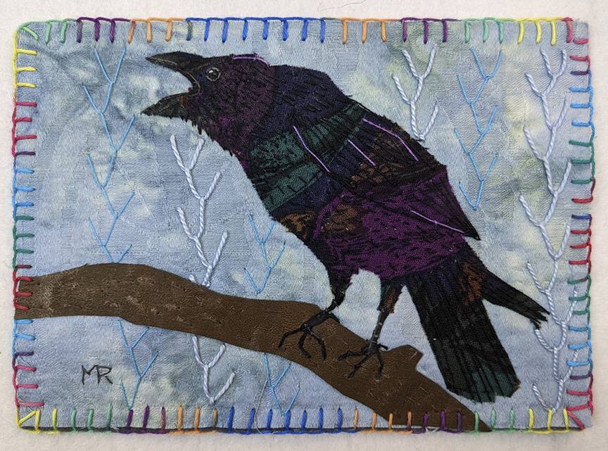 dyed fabric used in an art quilt to depict a crow crying on a branch